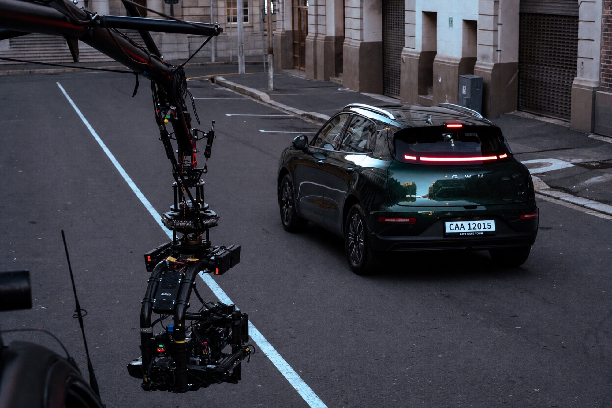 Big Bird camera tracking vehicle filming road action
